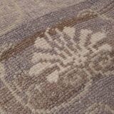 Vintage midcentury karapinar floral brown wool rug