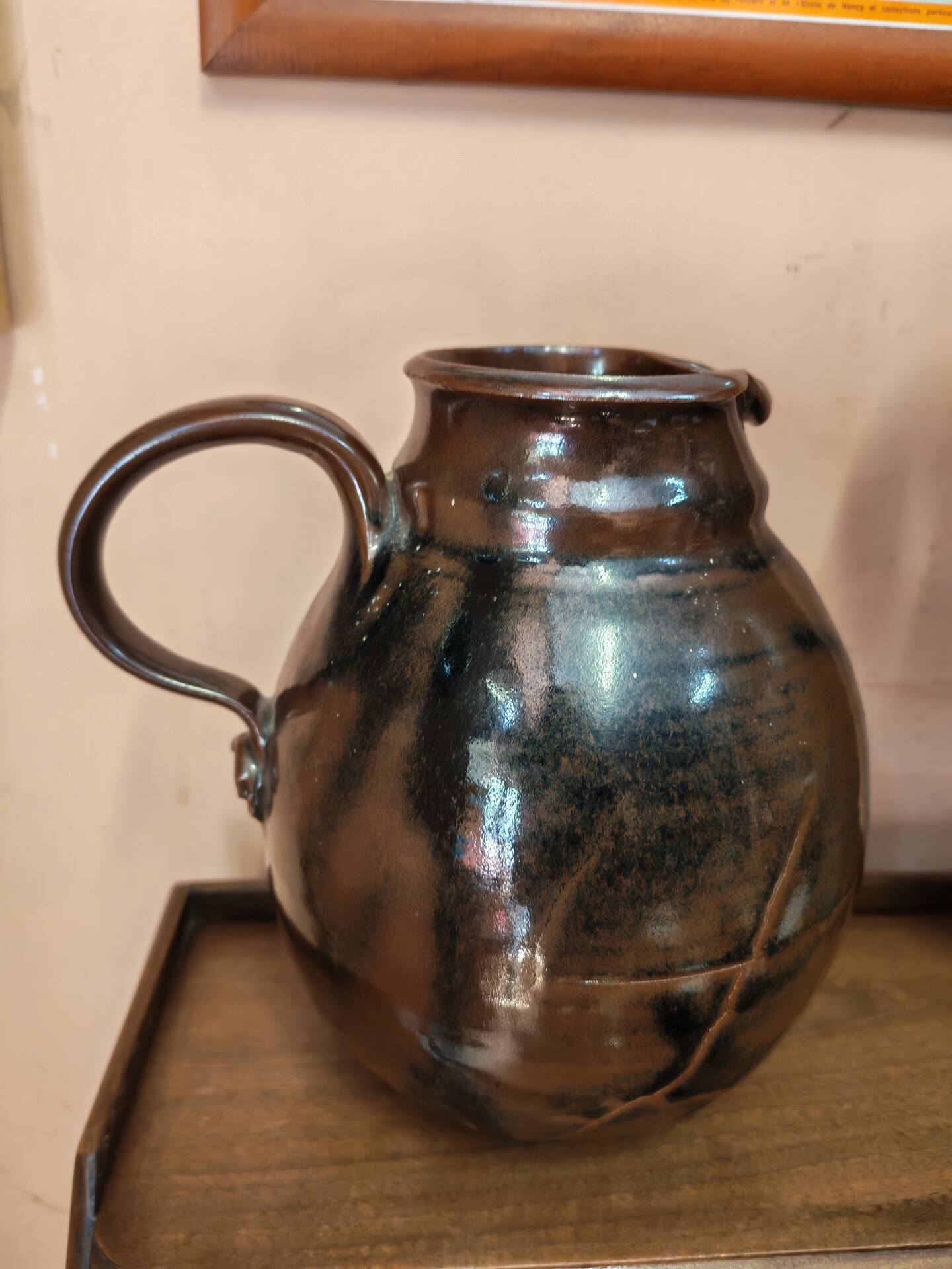 Set of three vintage ceramic jugs and a pitcher.