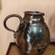 Set of three vintage ceramic jugs and a pitcher.