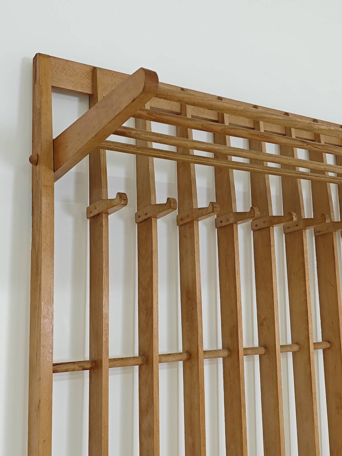 Wooden wall coat rack by Krasna Jizba