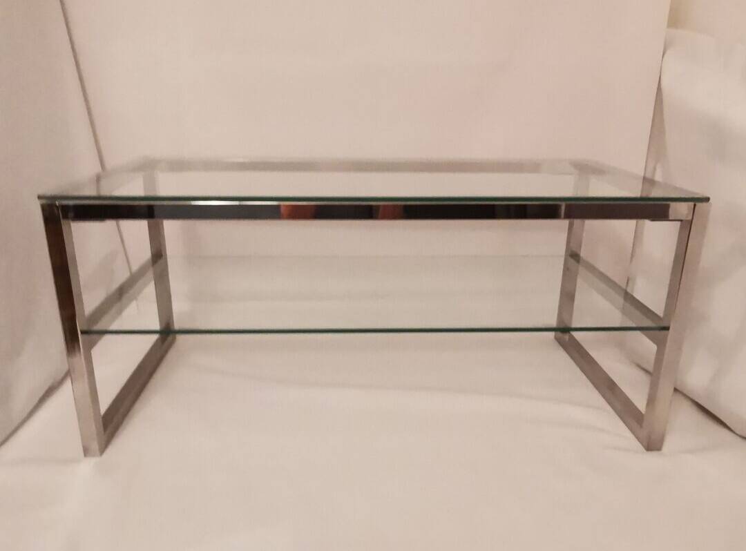1980s coffee table with a double chrome metal top.
