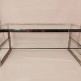 1980s coffee table with a double chrome metal top.