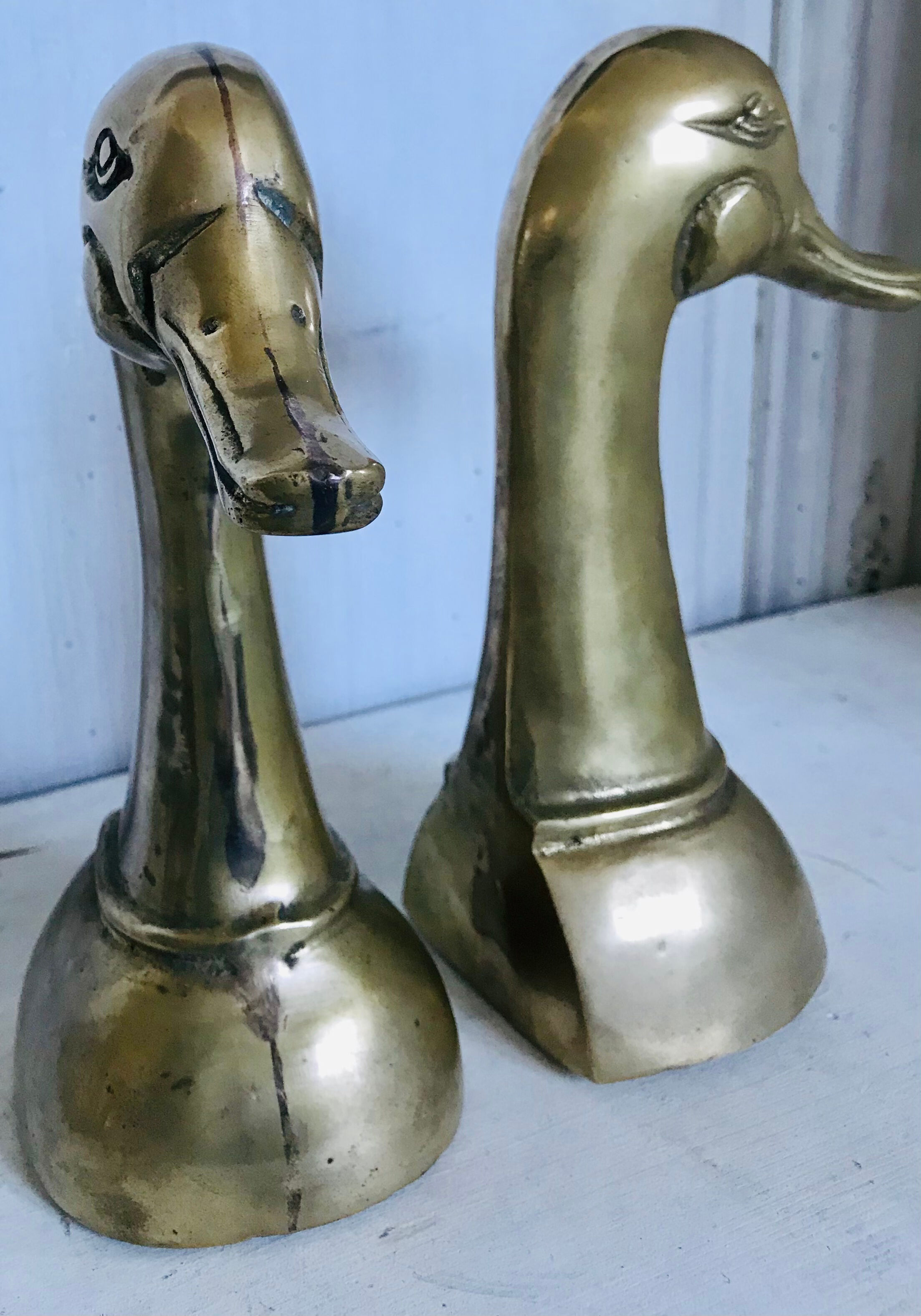 Pair of brass book ends 21cm