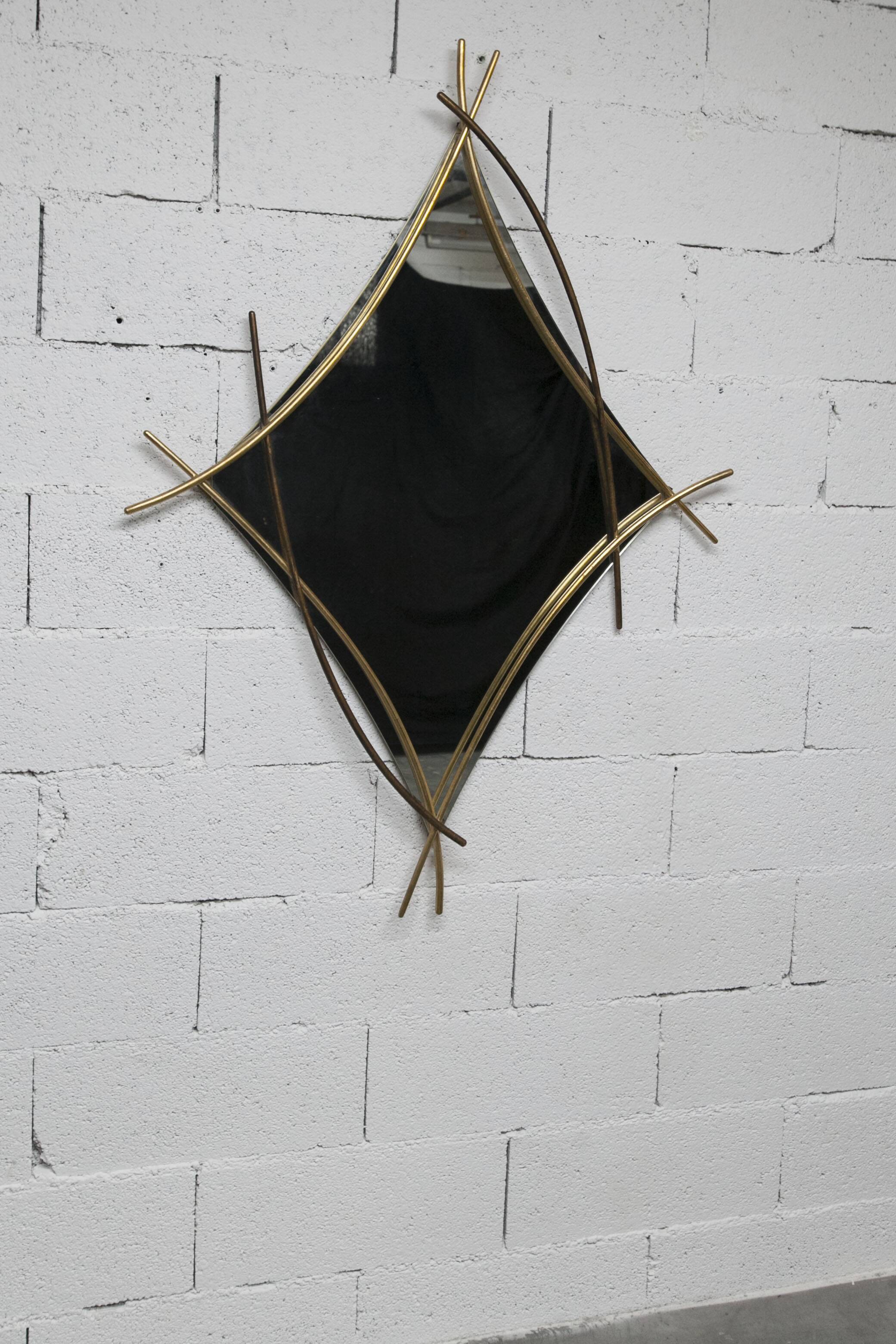 Sculptural mirror with two-tone gilded arches, France, 1970s, 95 x 133 cm