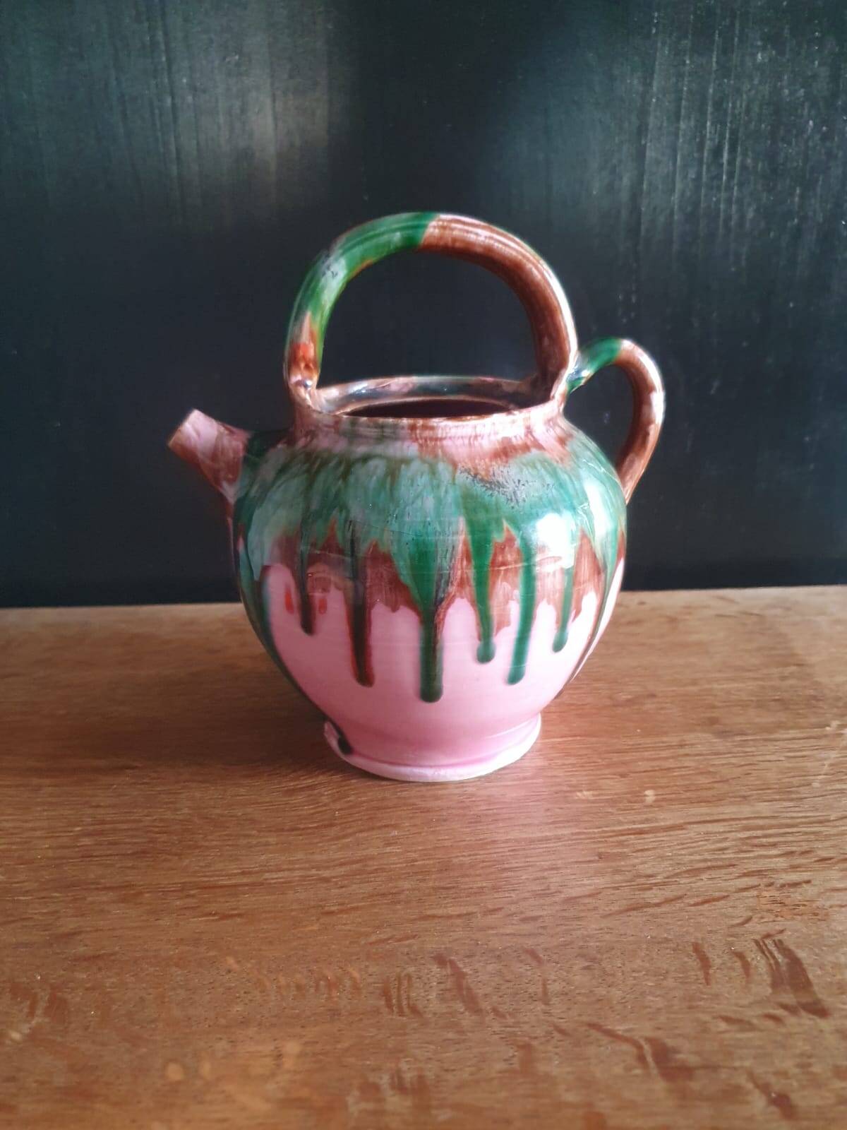 Jug pitcher Provençal earthenware glazed with pink and green glaze.