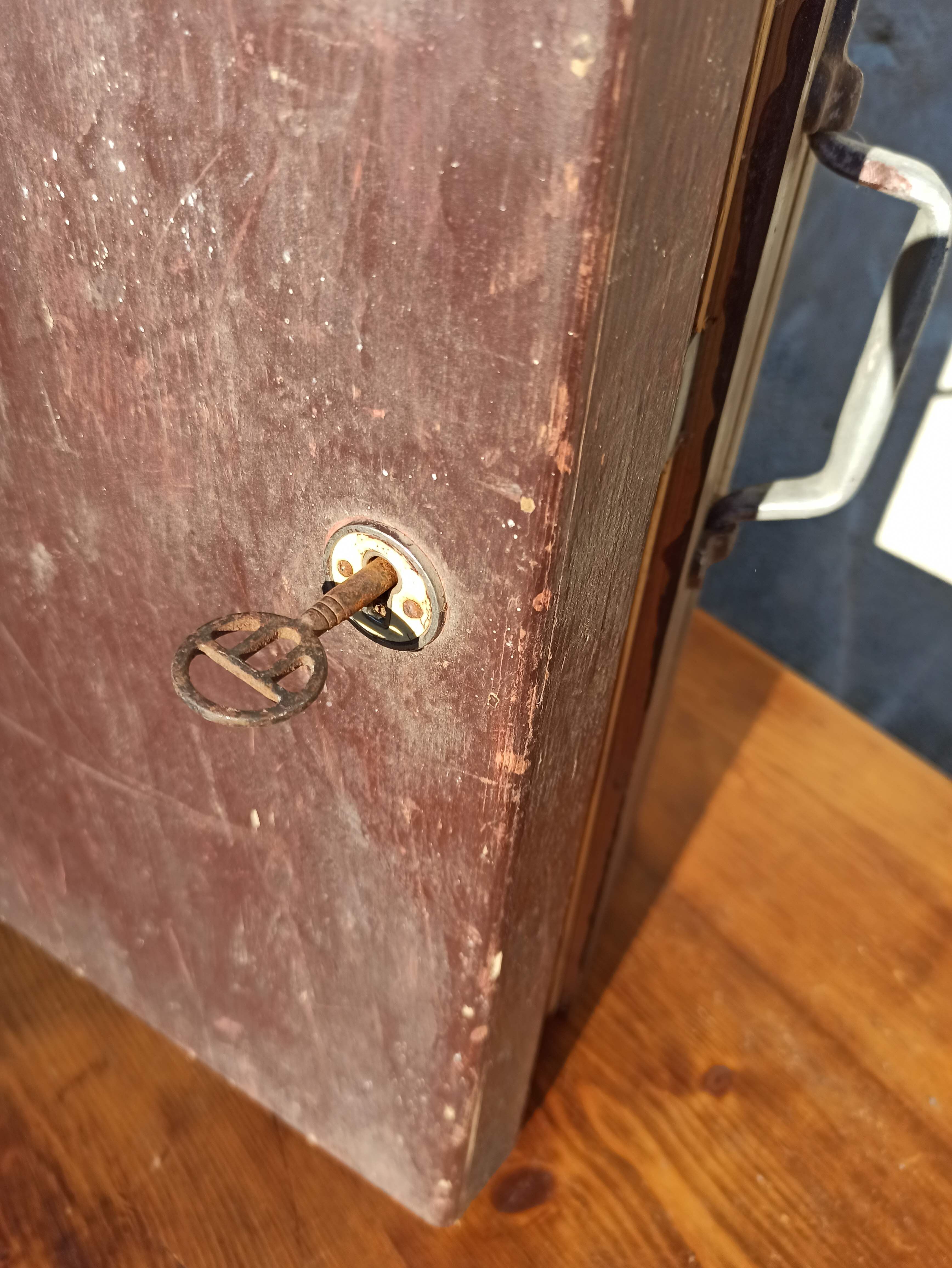 Antique wooden suitcase with lock and key