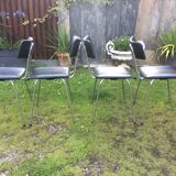 4 Chairs with chrome tubular metal base and black Skaï