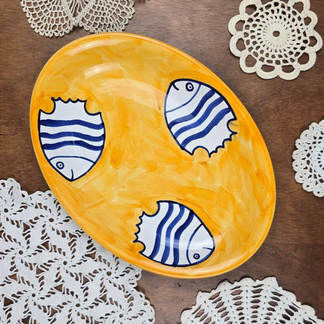 Oval dish decorated with hand-painted blue fish, Mediterranean style