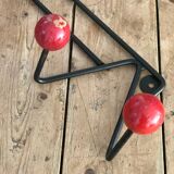 Red and black coat rack