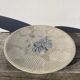 Ethnic handmade round fish dish