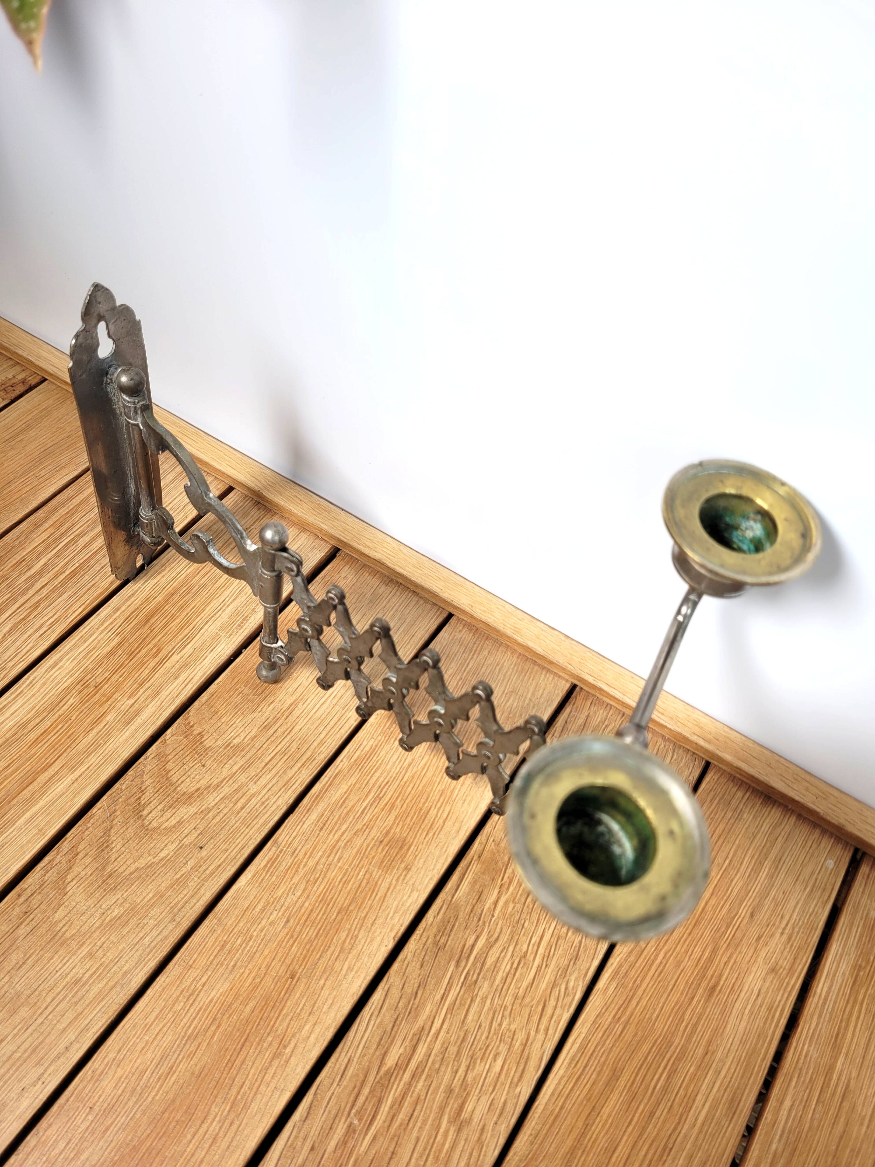 Extendable wall candle holder