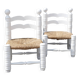 Pair of rush-seated chairs by Charles Dudouyt