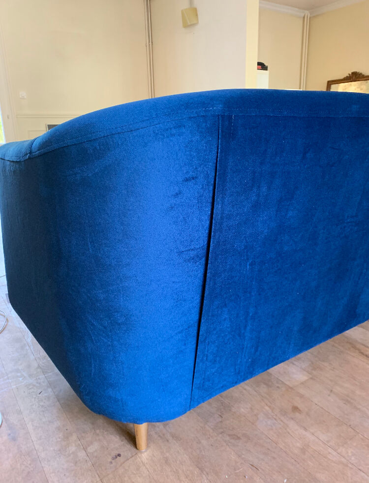 Blue velvet sofa