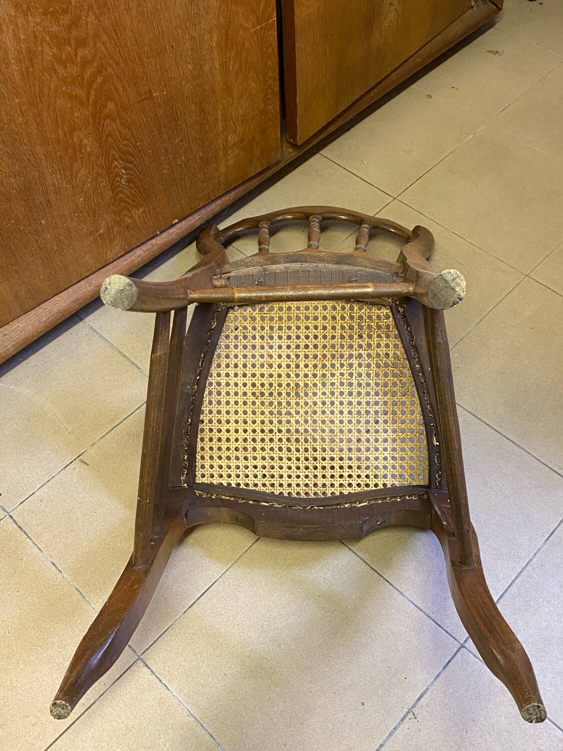 Antique wooden chair, cane seat