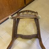 Antique wooden chair, cane seat