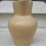 Beige ceramic pitcher