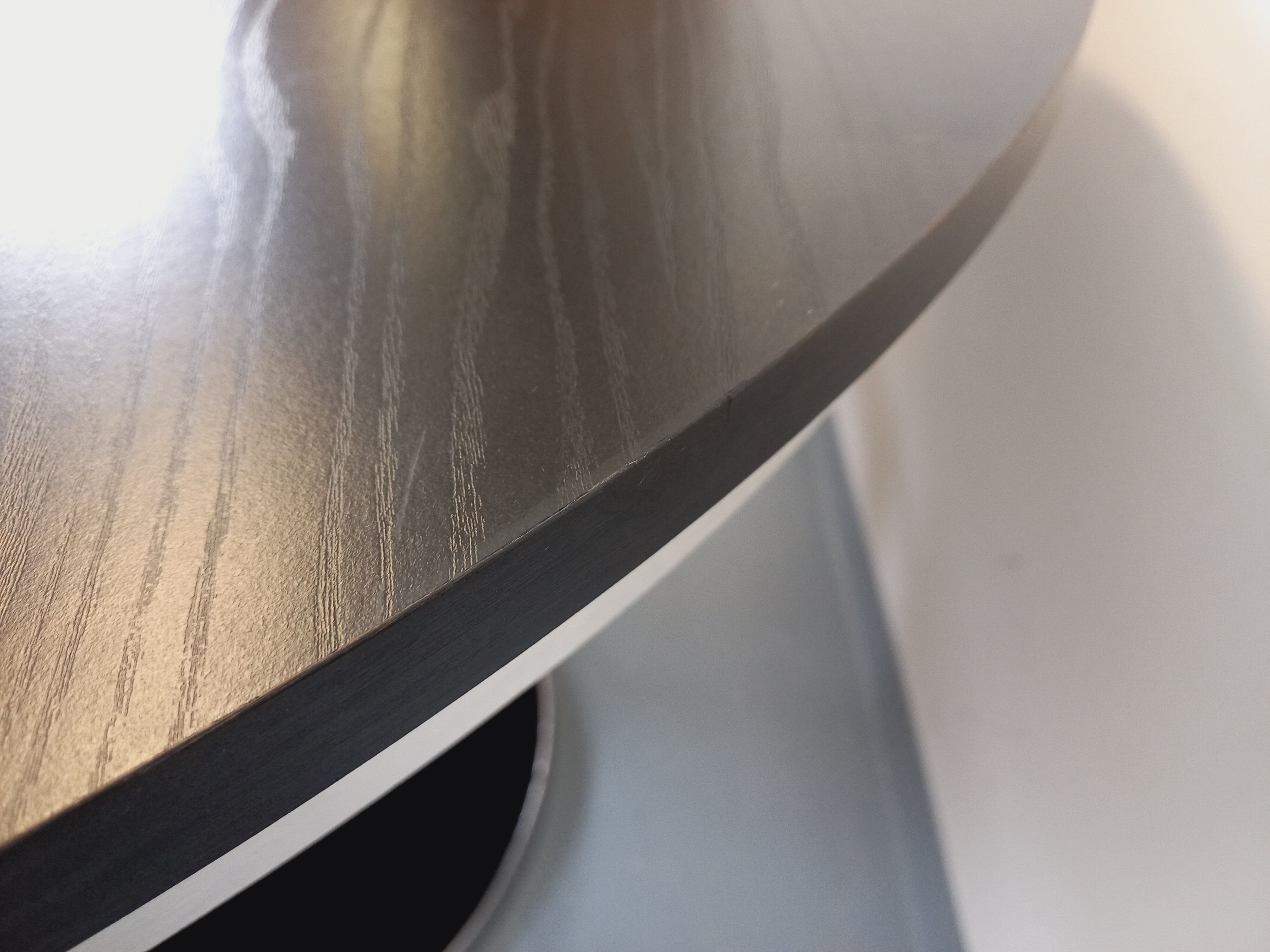Vintage dining table in melamine with a black wood effect and chrome metal.