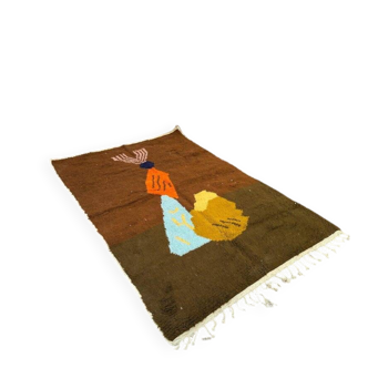 Moroccan wool rug with traditional colourful patterns, size 140 x 260 cm.