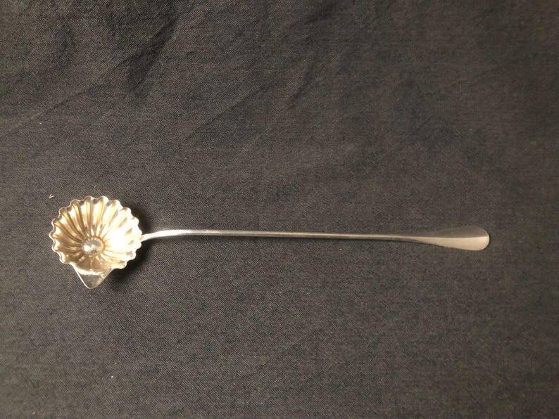 A fine silver-plated Art Nouveau sauce spoon/punch ladle, made by S.F.A.M.,
