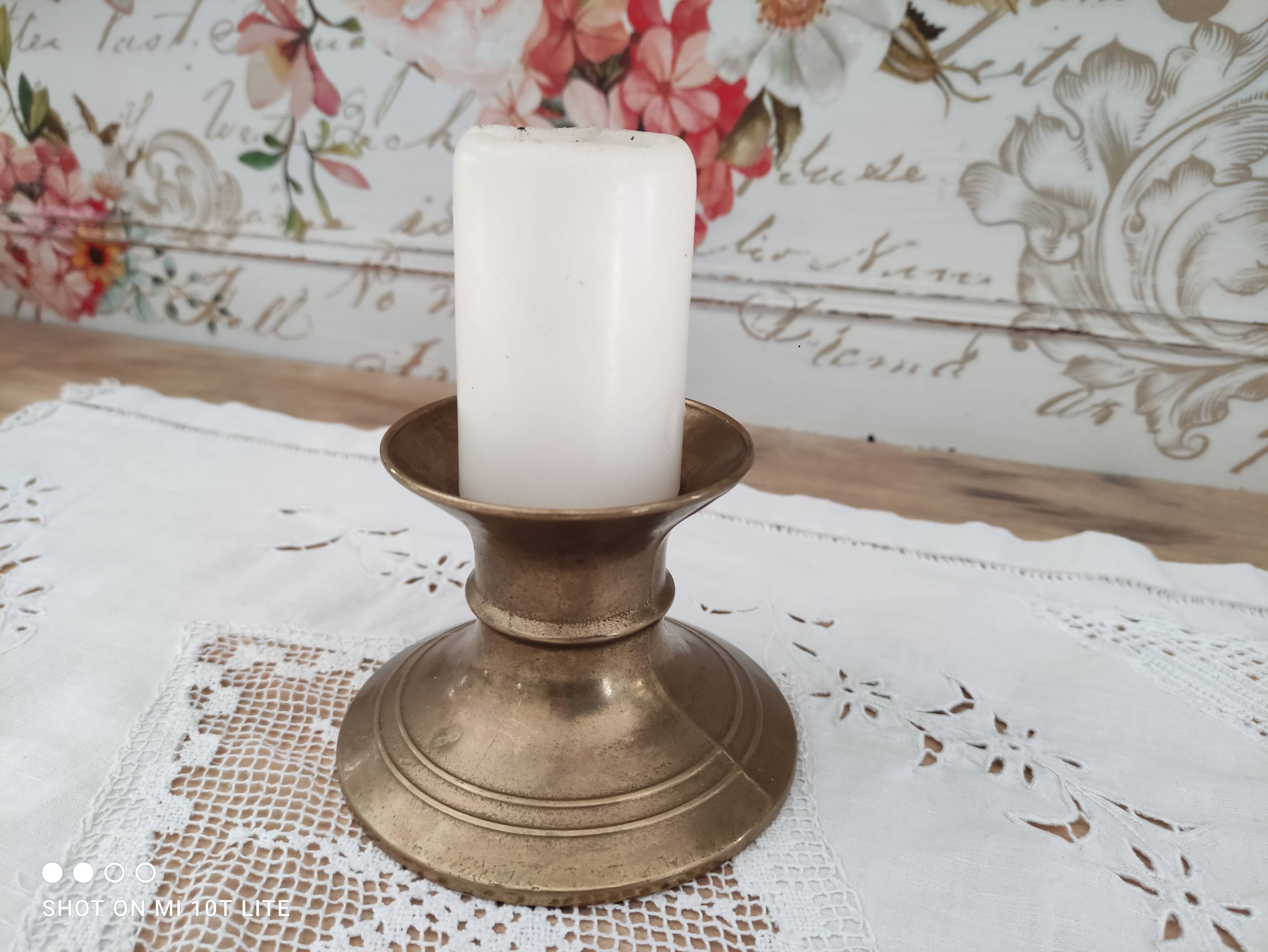 Low brass candle holder