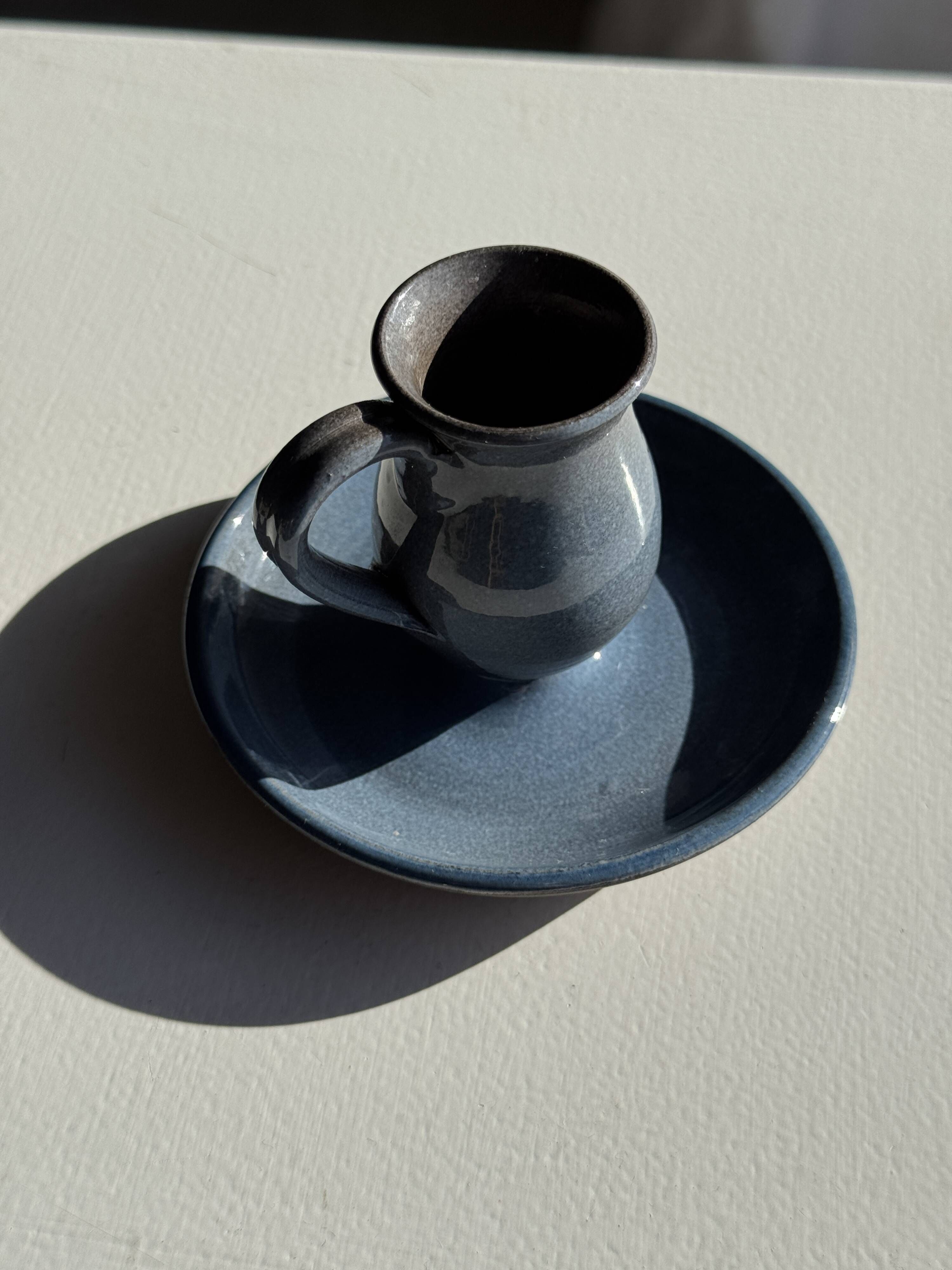 Vintage hand-held candlestick in blue glazed stoneware with floral decoration by Poterie Millian.