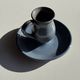 Vintage hand-held candlestick in blue glazed stoneware with floral decoration by Poterie Millian.