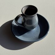 Vintage hand-held candlestick in blue glazed stoneware with floral decoration by Poterie Millian.
