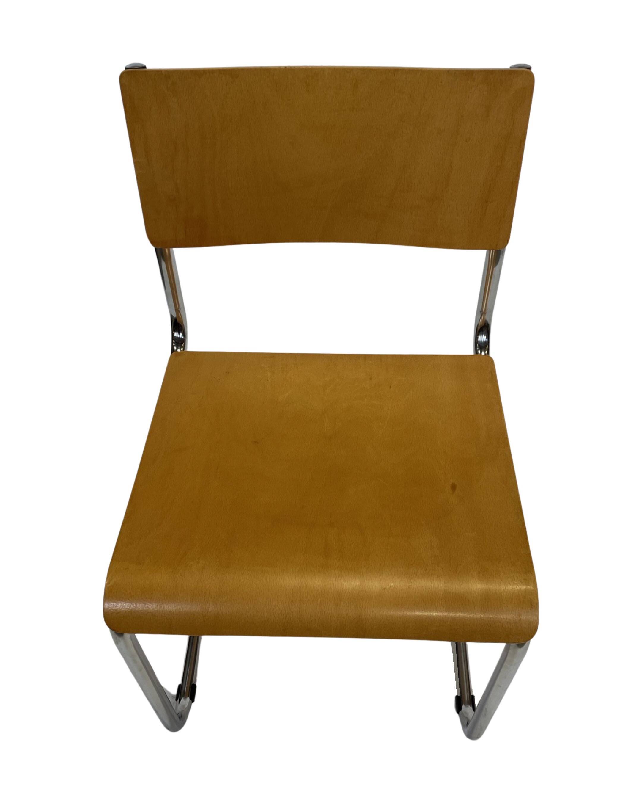 Set of four vintage dining room chairs, wood and chrome,  1970s
