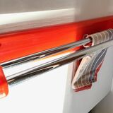 Orange towel rack by Syla from the 70s