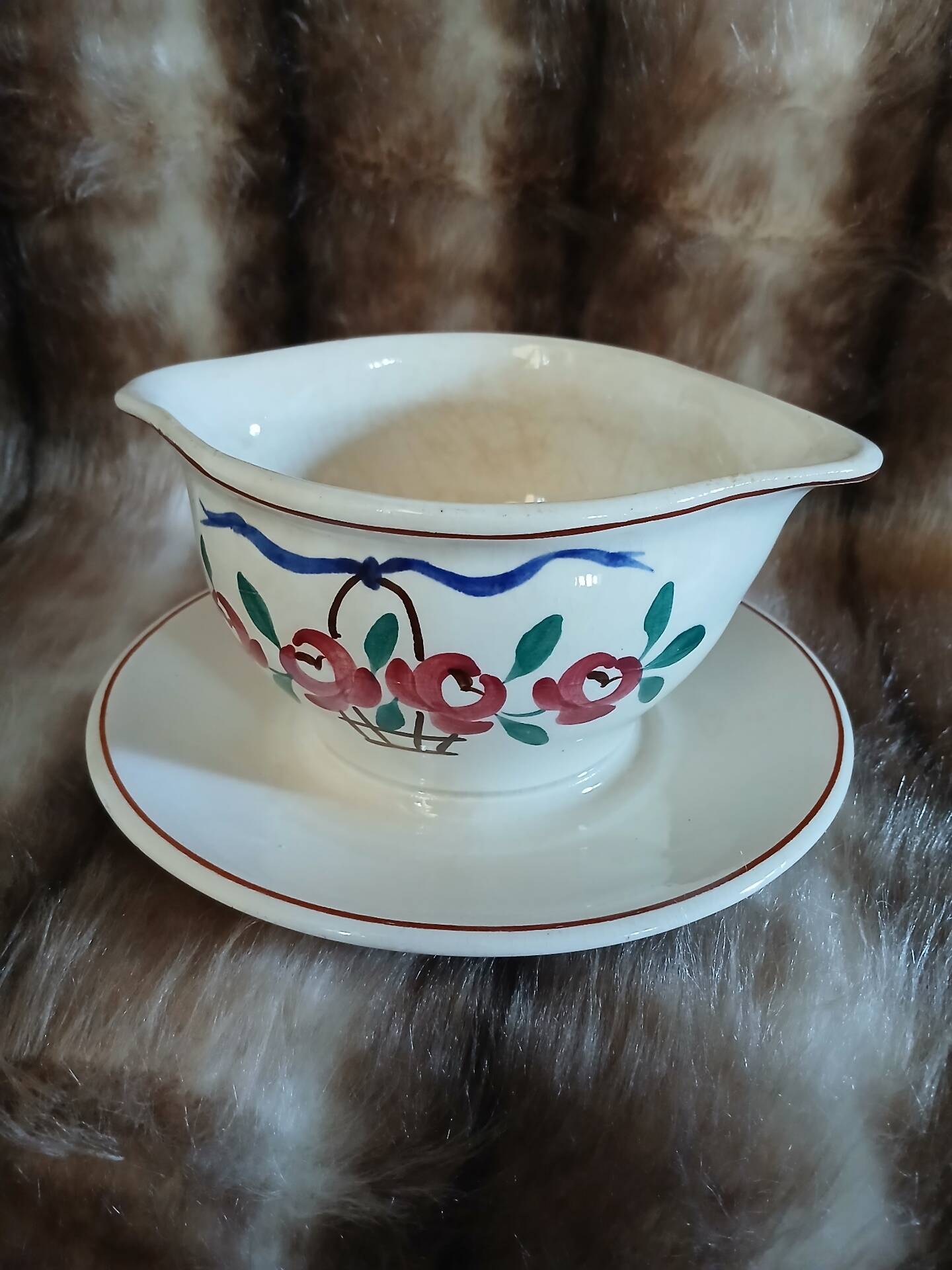 Antique sauce boat in Longchamp ironstone.