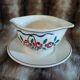 Antique sauce boat in Longchamp ironstone.