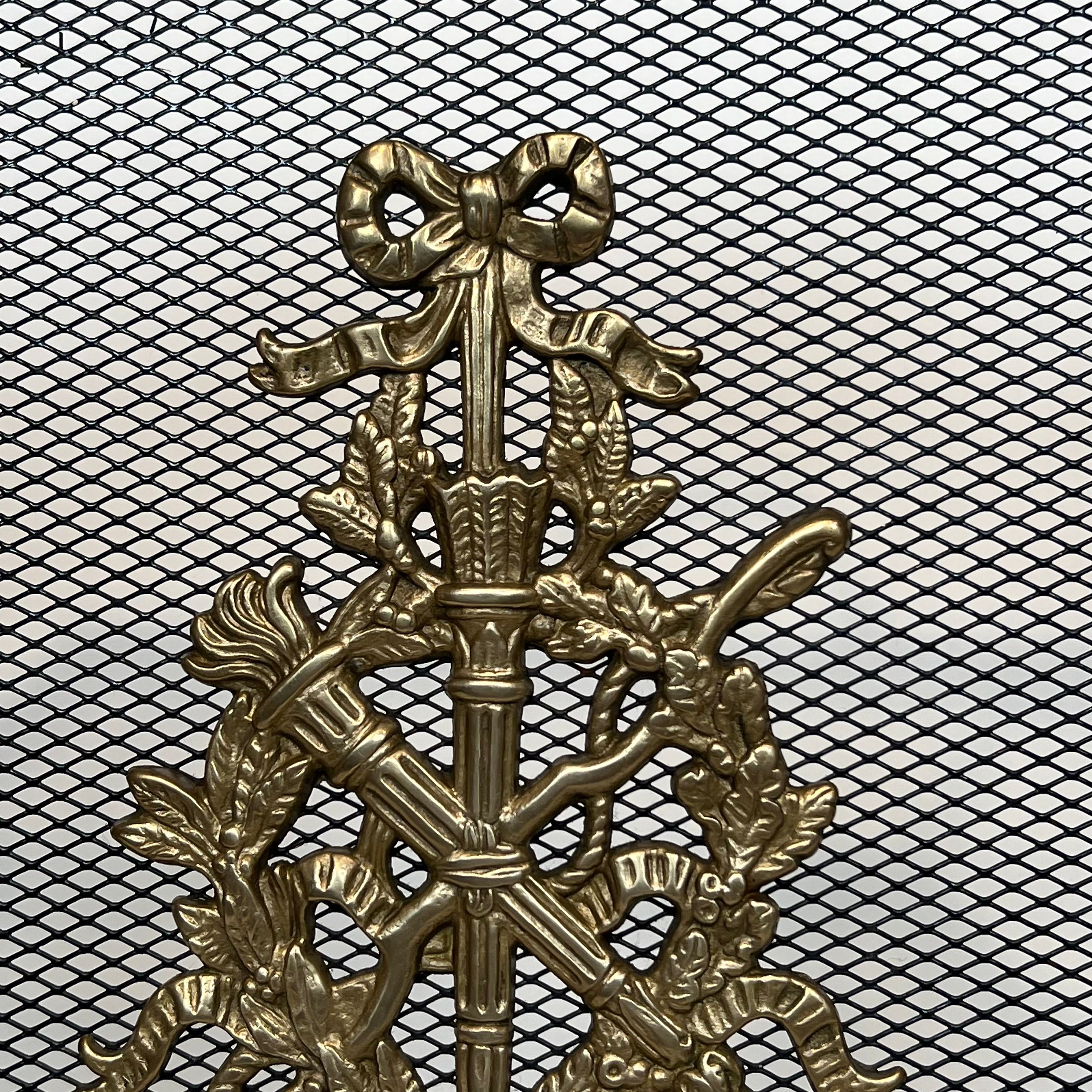 Brass fire screen and grille in the Louis XVI style in the taste of Maison Jansen.