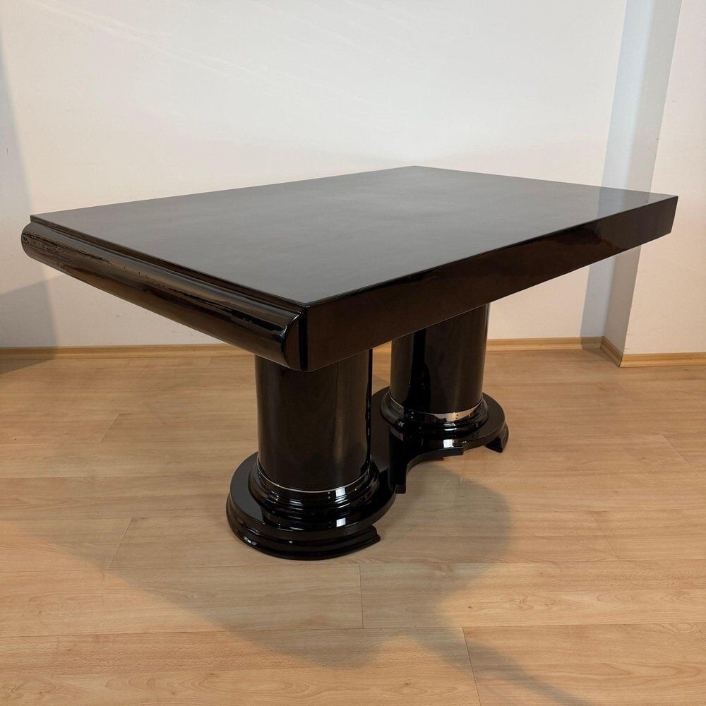 Art Deco dining table in black piano lacquer & metal, 1930