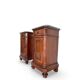 A pair of antique walnut bedside tables from the 1890s.
