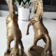 of greenhouse art deco bookends recancing unicorns. solid brass