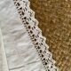 Old cotton and lace pillowcase.