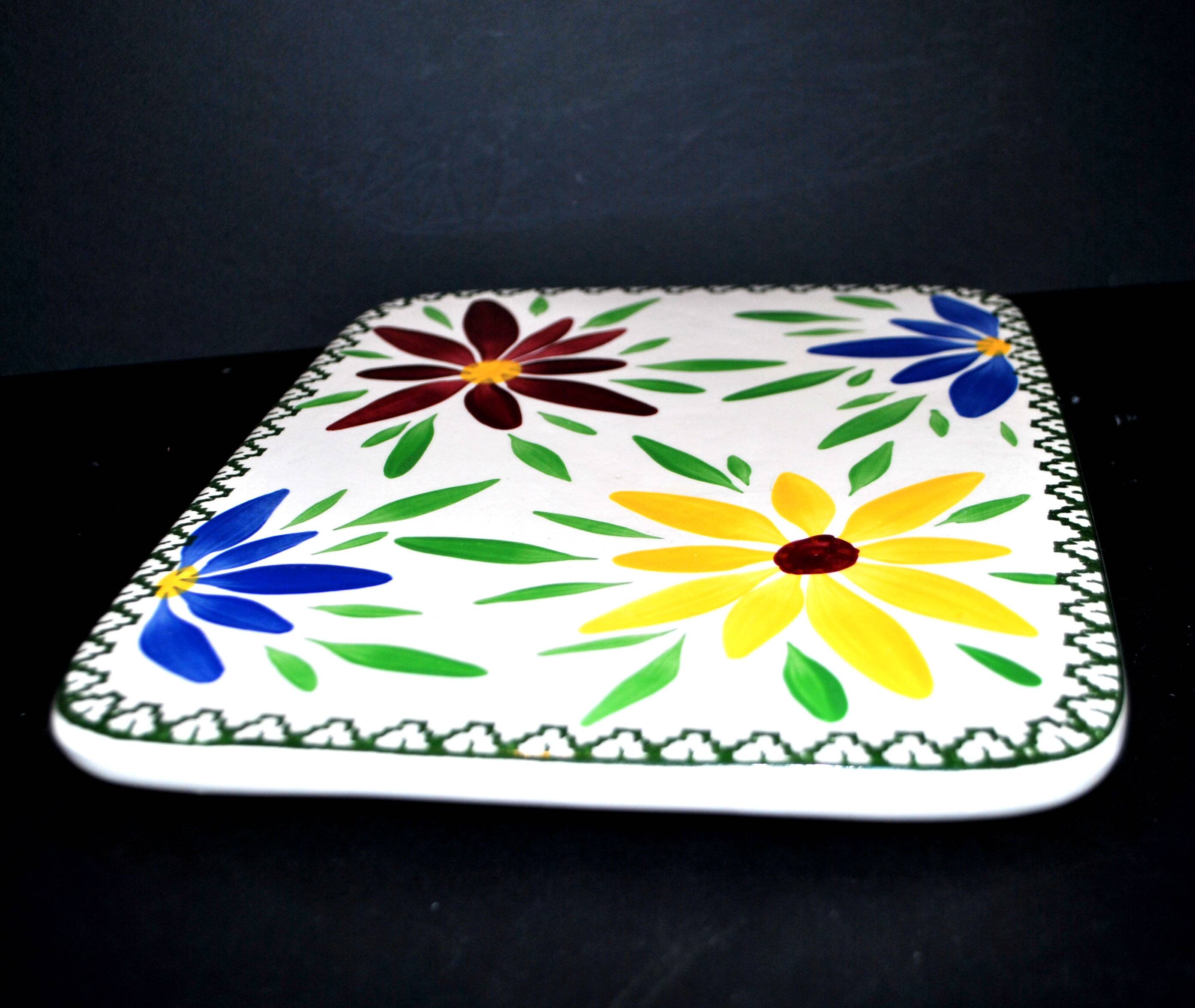 Vintage ceramic trivet from Saint-Clément - floral 1960-1970