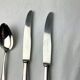 Paire de couteaux et cuillère de table argent Deetjen 100