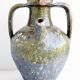 Ancient oil jar in glazed terracotta, khaki green — Auvergne, Lezou