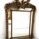 Miroir a parecloses de style Louis XVI en bois et stuc doré XIX siècle