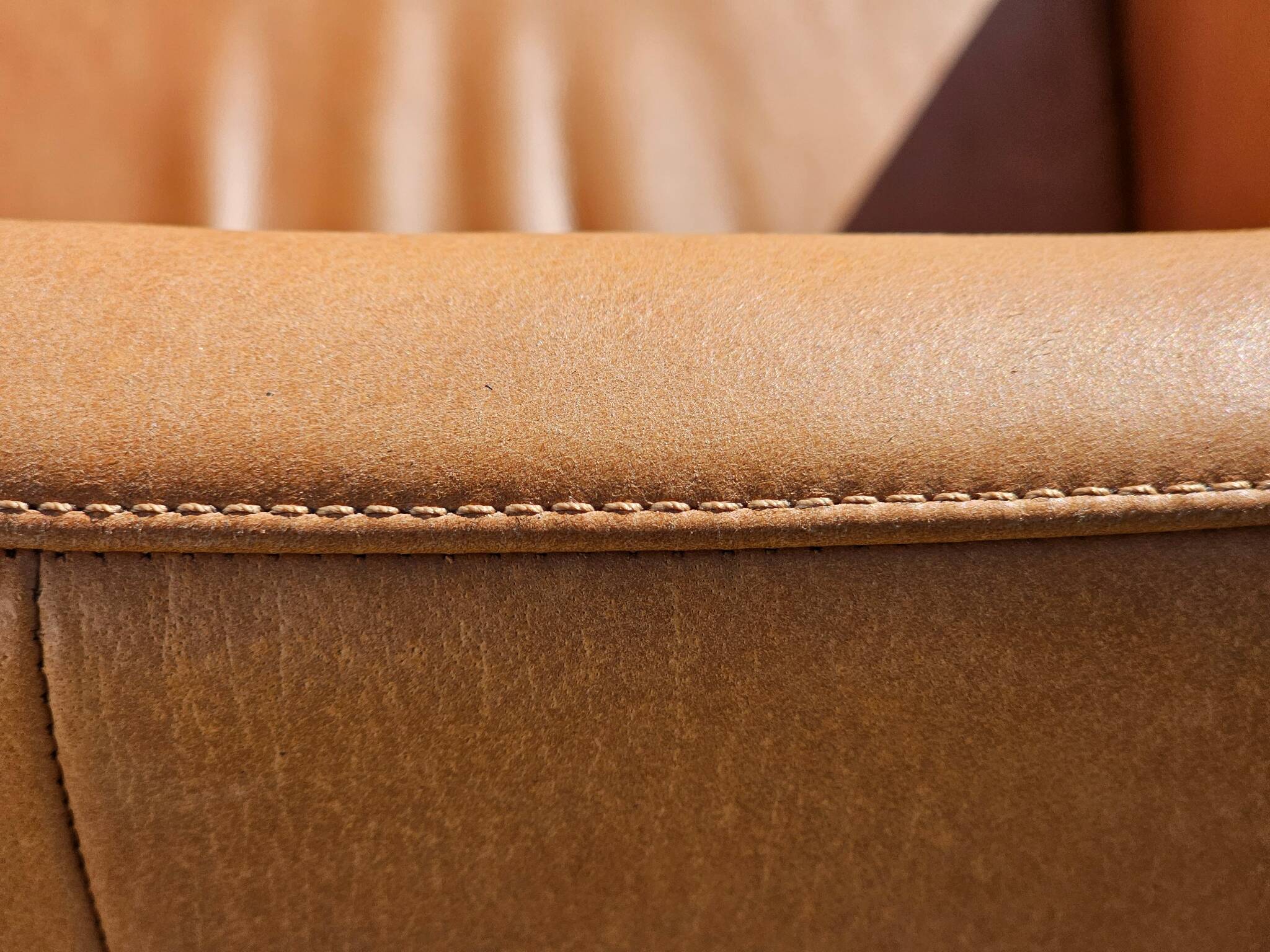 Armchair + matching ottoman – leather – 2000