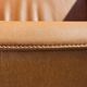 Armchair + matching ottoman – leather – 2000
