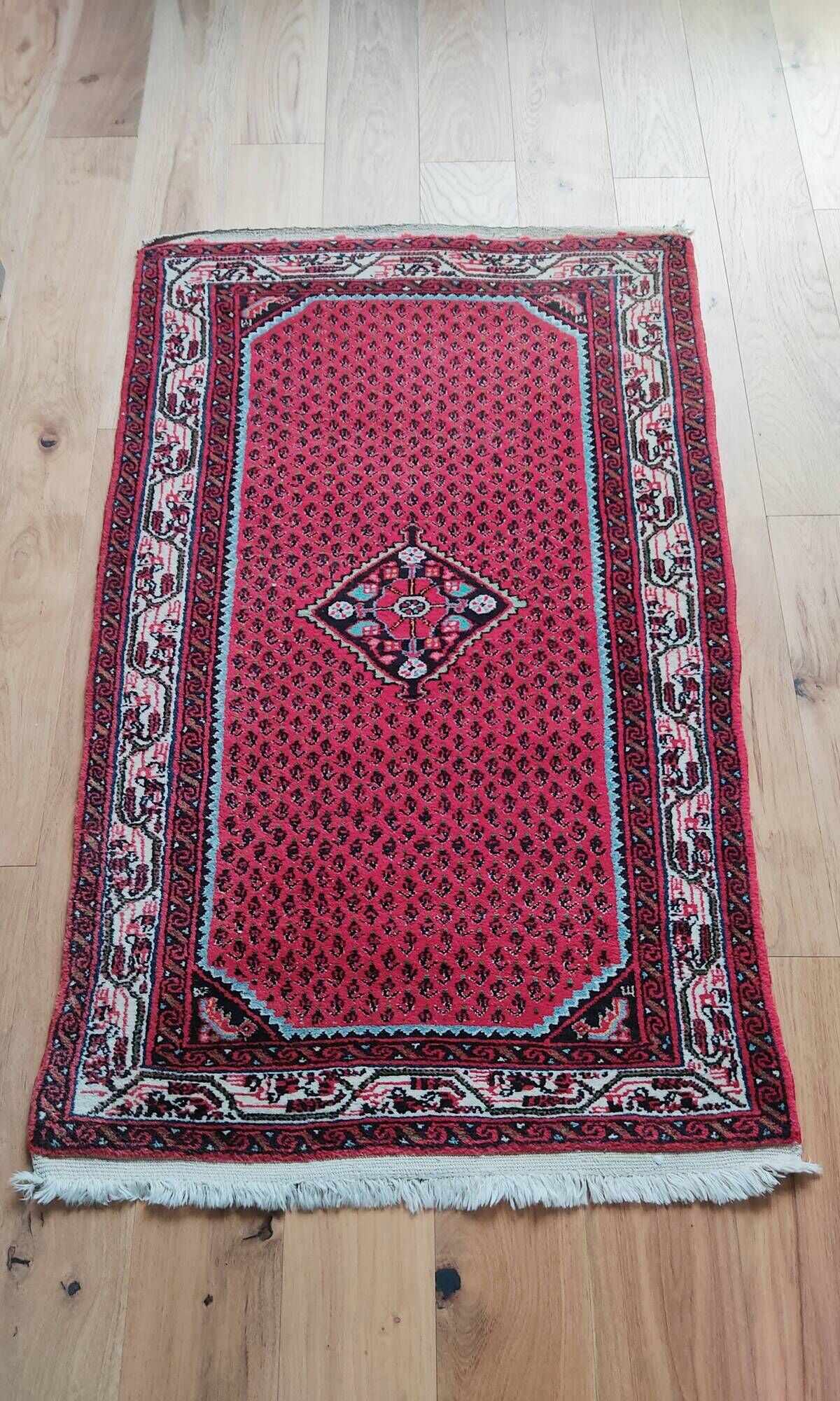 Oriental carpet 79 x 130 cm