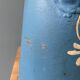 Old painted sheet metal jug or milk jug