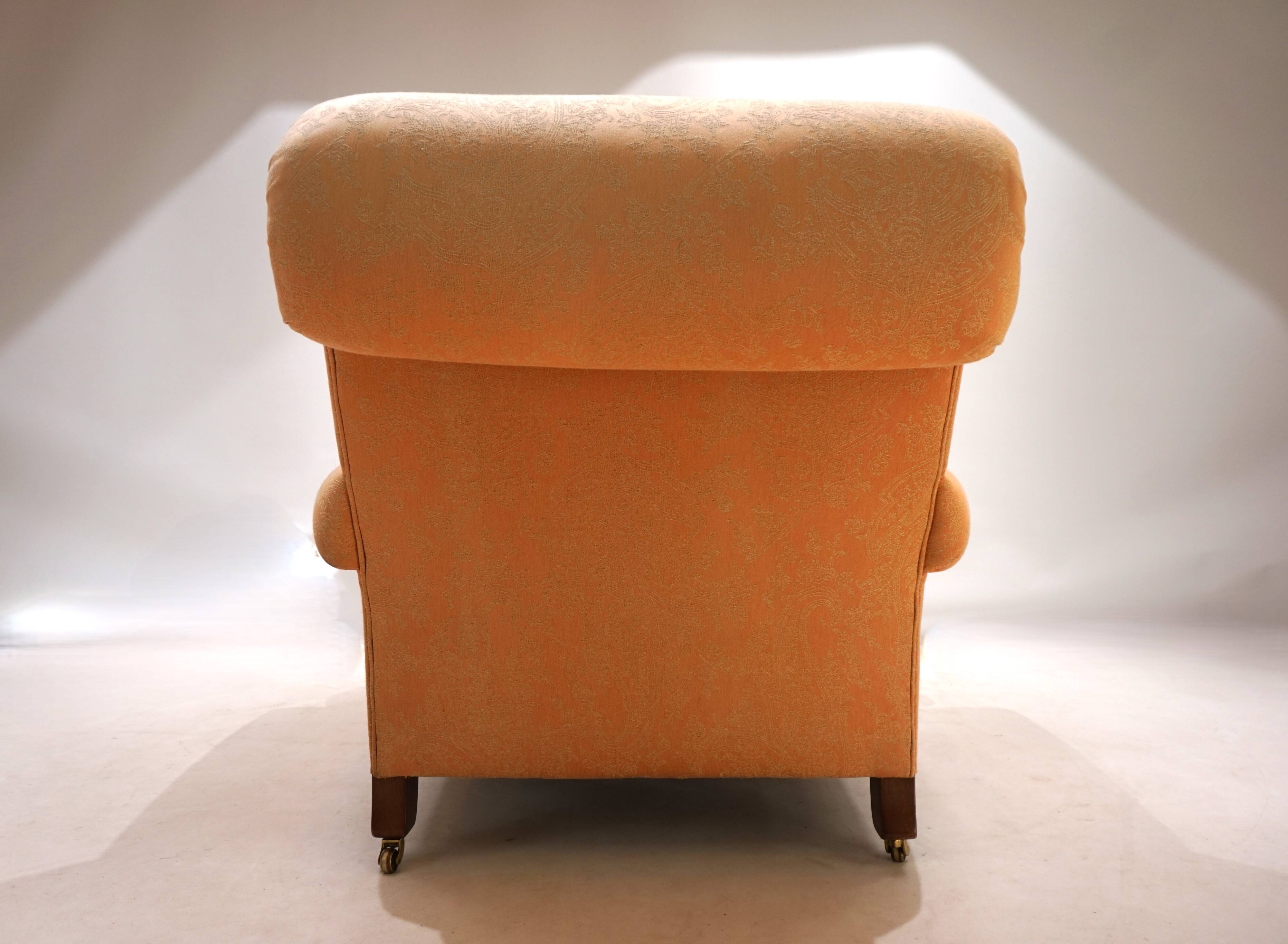 Deep seated armchair in the style of Howard & Sons