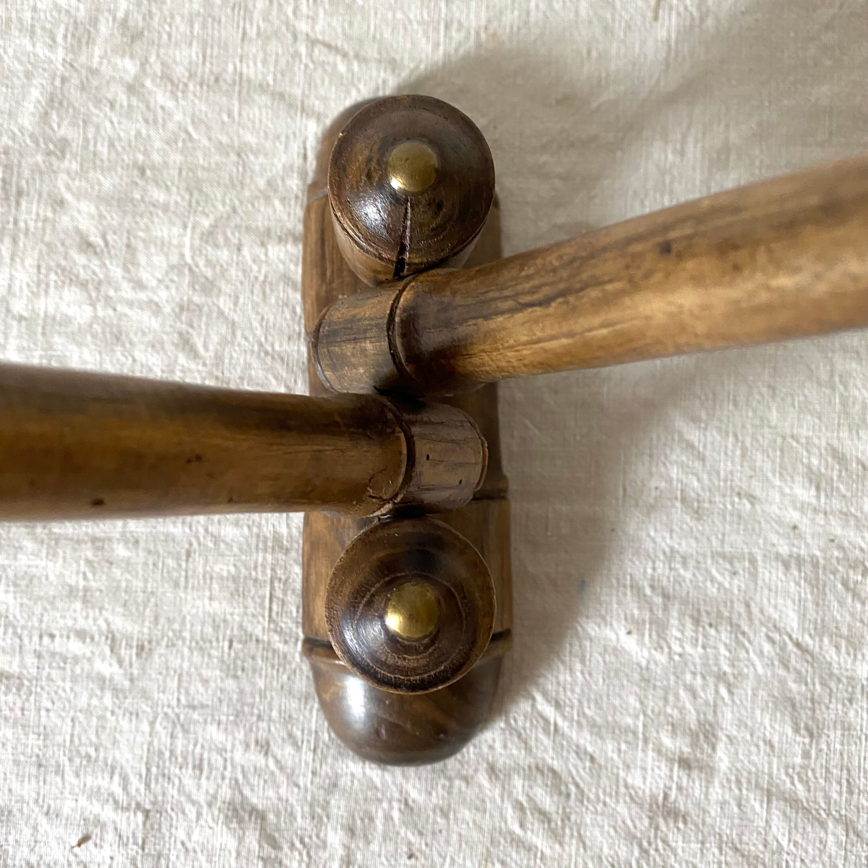 Turned wooden towel rack