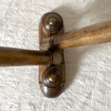 Turned wooden towel rack