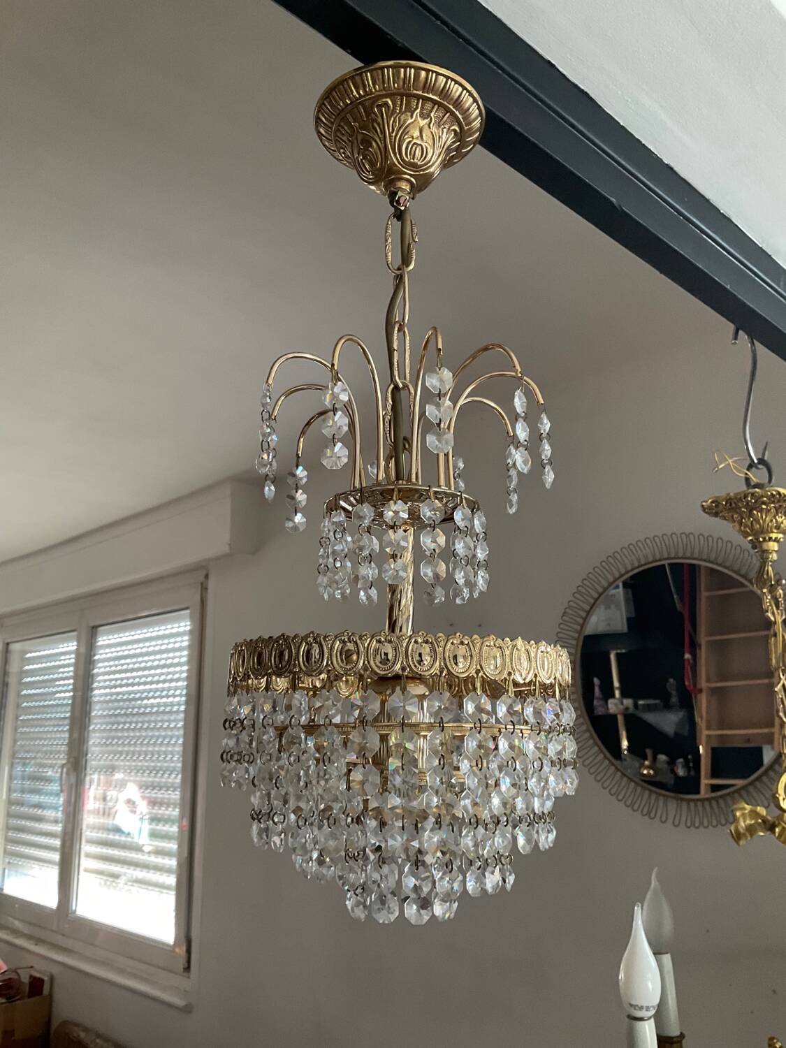 Cascade chandelier with crystal and brass tassels