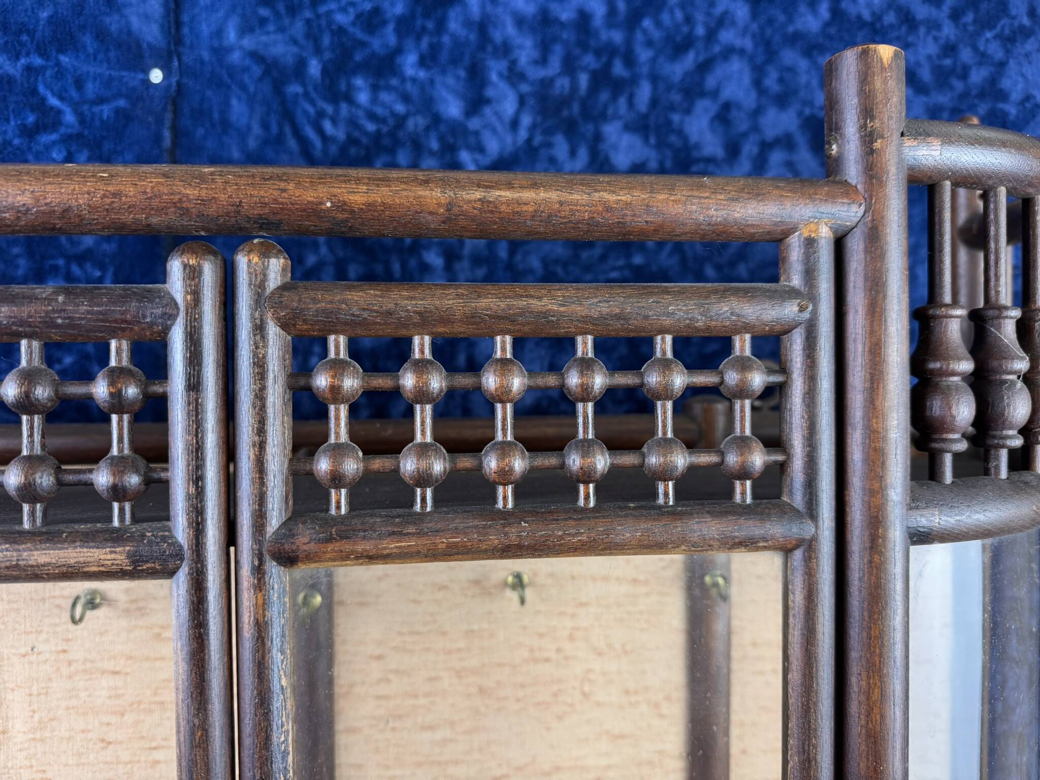 Asia 19th century: Magnificent collector's display case with tapestry background