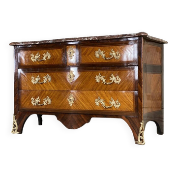 Louis XV style commode in rosewood and palisander veneer, gilt bronze mounts, and Rance marble top.